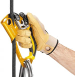 Petzl Ascension Ascender yellow ergonomic right-hand rope climbing device with dual-density grip and toothed cam